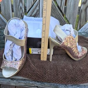 Carlos Santana sparkly heels.